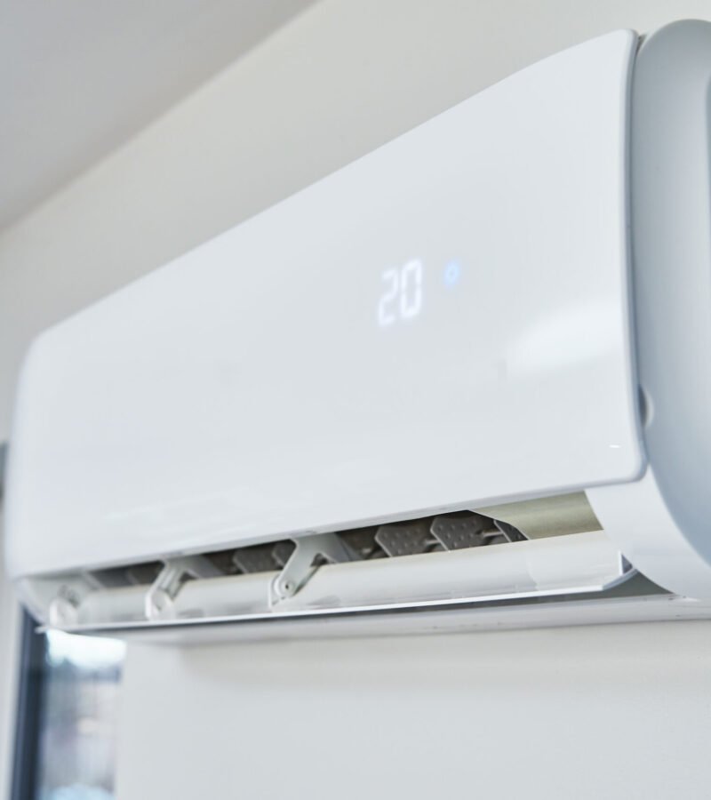 Adjusting temperature on air conditioner, Working air conditioner for comfort temperature in home at hot summer, cooling air in the room